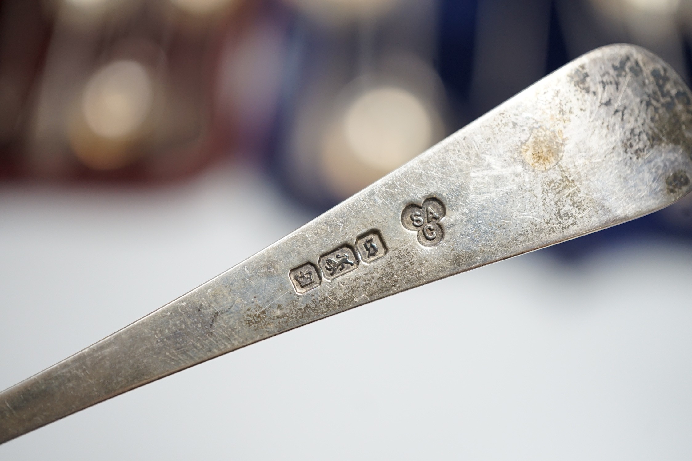 Two cased sets of six silver teaspoons and sugar tongs, including Sheffield, 1908.